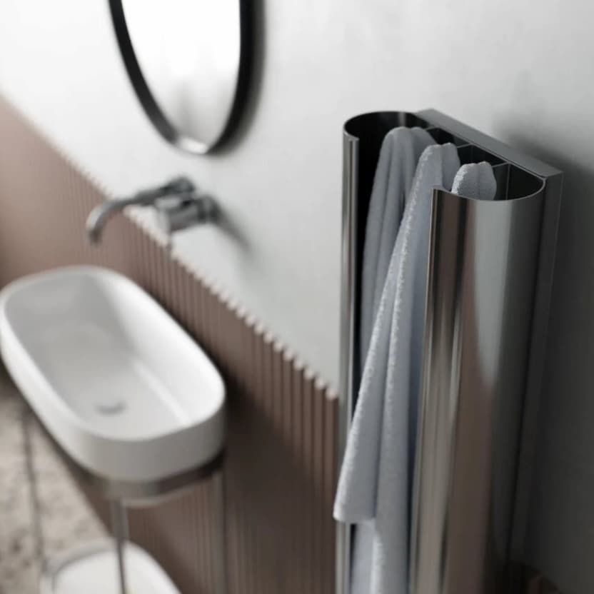 Loop polished pewter on wall